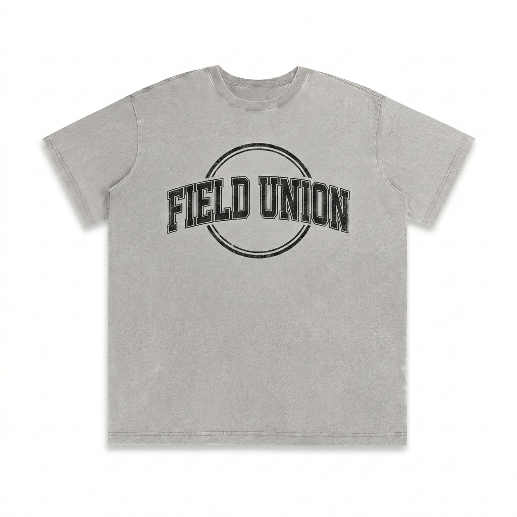 Custom Vintage Washed T-Shirt design direction 3: Retro Collegiate Emblem featuring the FIELD UNION wordmark