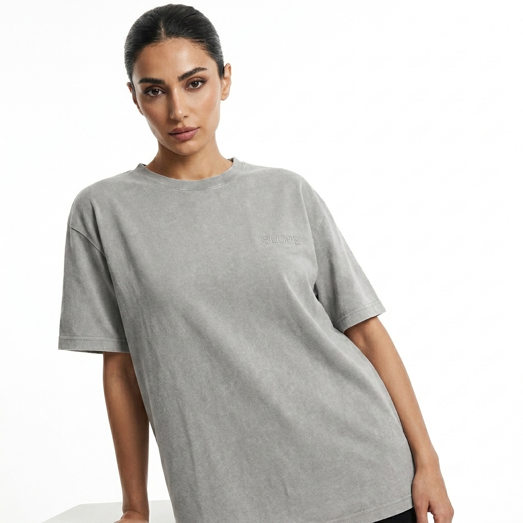Vintage Washed T-Shirt worn by a lean Persian female fashion influencer, minimalist luxury styling, studio lookbook — custom vintage washed t-shirt
