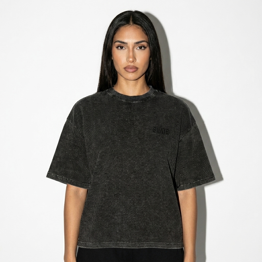 Textured Waffle Boxy T-Shirt worn by a slim tall Latino female fashion influencer, clean-girl minimal styling, studio lookbook — custom textured waffle boxy t-shirt