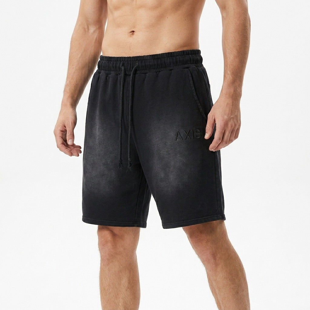 Washed Cotton Lounge Shorts worn by a lean German male fashion influencer, sporty athleisure styling, studio lookbook — custom washed cotton lounge shorts
