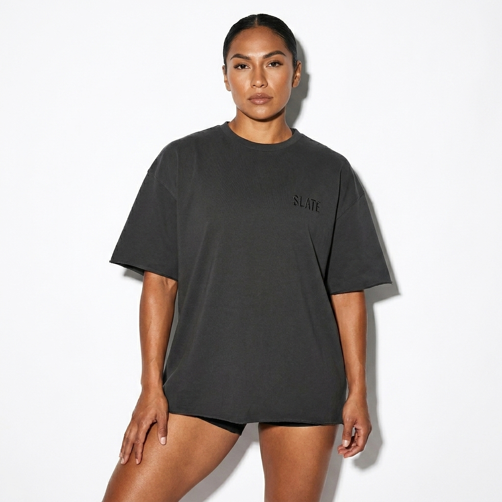 Washed Half-Sleeve T-Shirt worn by a athletic muscular Indigenous American female fashion influencer, workwear utility styling, studio lookbook — custom washed half-sleeve t-shirt