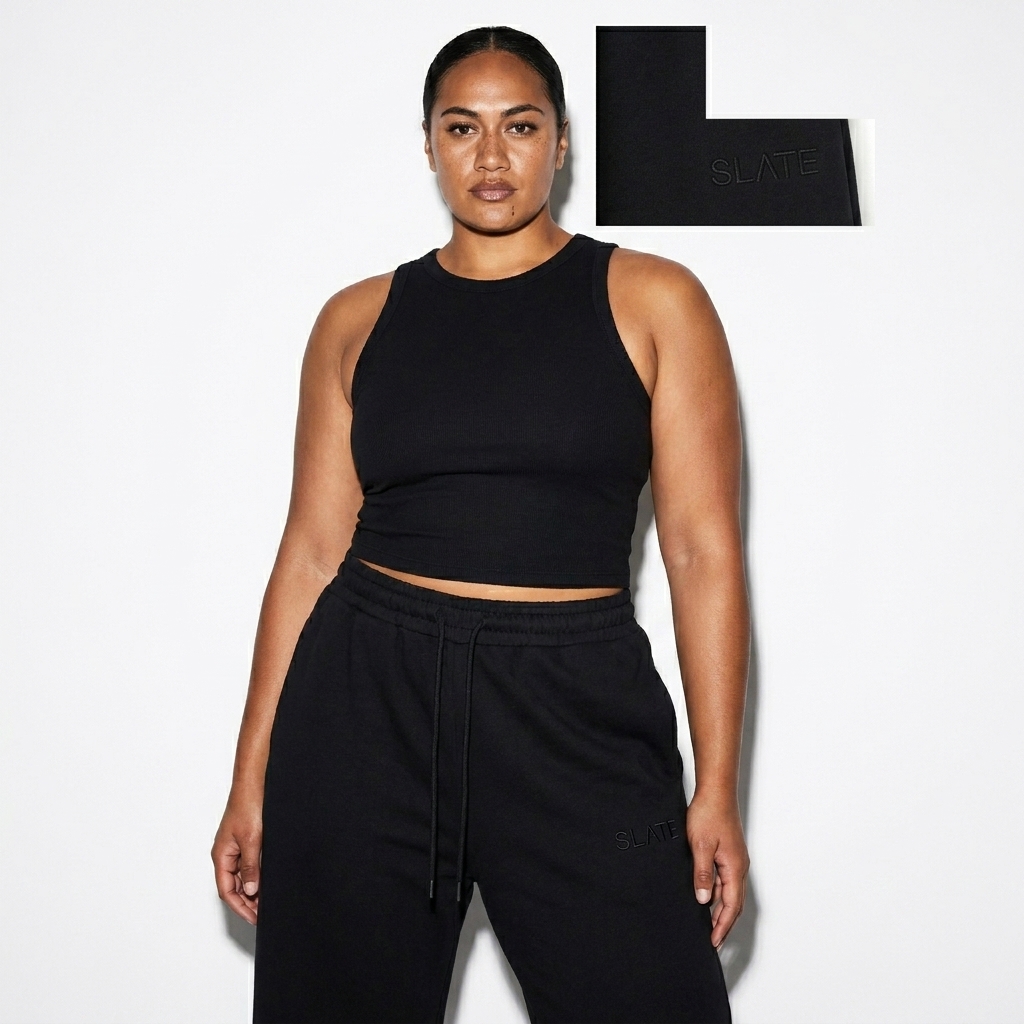 Straight-Leg Sweatpants worn by a broad-shouldered Māori female fashion influencer, workwear utility styling, studio lookbook — custom straight-leg sweatpants