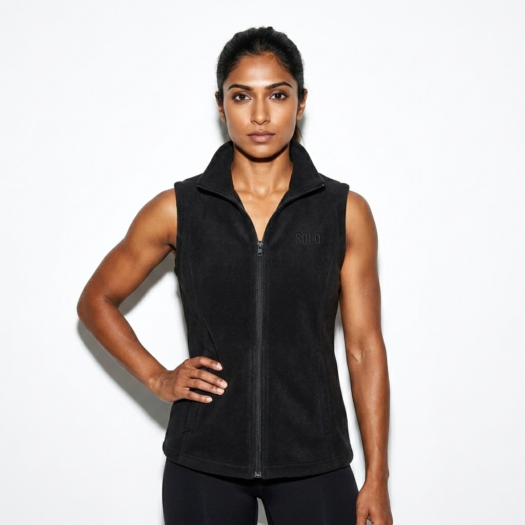 Women's Fleece Vest worn by a athletic muscular Indian female fashion influencer, y2k revival styling, studio lookbook — custom women's fleece vest