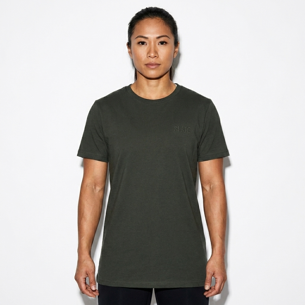 Women's High-Waisted Tee worn by a athletic muscular Vietnamese female fashion influencer, downtown streetwear styling, studio lookbook — custom women's high-waisted tee