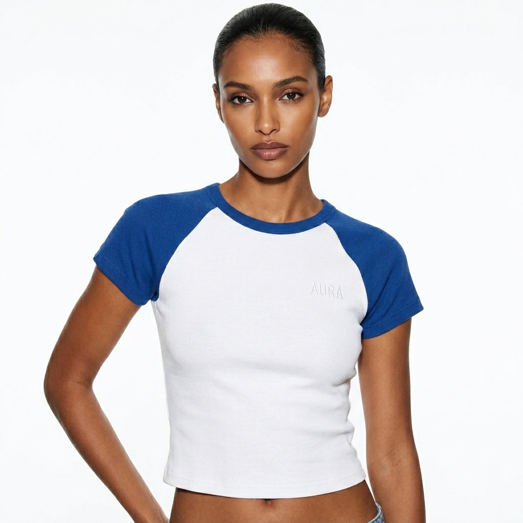 Women's Micro Rib Raglan Tee worn by a lean North African female fashion influencer, techwear modern styling, studio lookbook — custom women's micro rib raglan tee