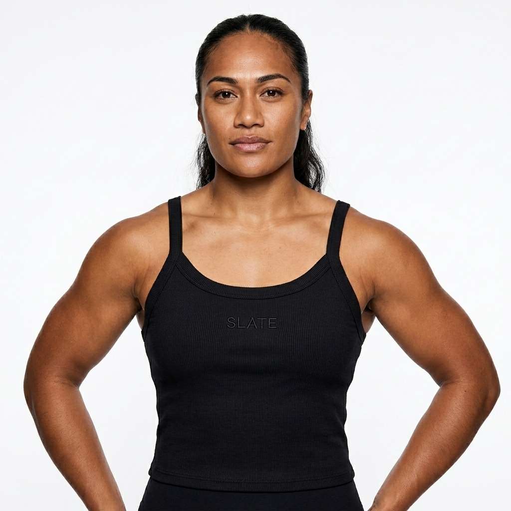 Women's Micro-Rib Tank Top worn by a athletic muscular Pacific Islander female fashion influencer, clean-girl minimal styling, studio lookbook — custom women's micro-rib tank top