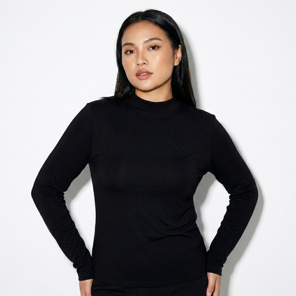 Women's Mock Neck Long Sleeve Tee worn by a mid-size Vietnamese female fashion influencer, downtown streetwear styling, studio lookbook — custom women's mock neck long sleeve tee