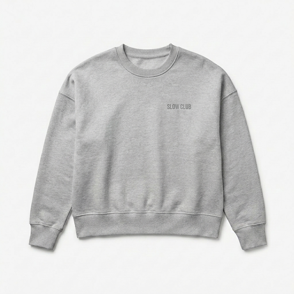 Custom Women's Organic Crewneck Sweatshirt design direction 1: Subtle Tonal Wordmark featuring the SLOW CLUB wordmark