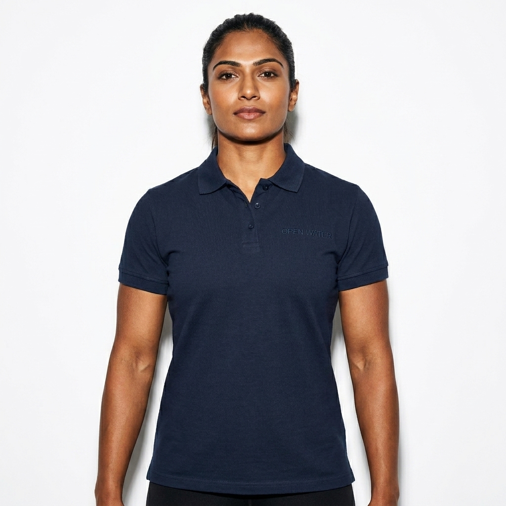 Women's Pique Polo Shirt worn by a athletic muscular Indian female fashion influencer, editorial avant-garde styling, studio lookbook — custom women's pique polo shirt