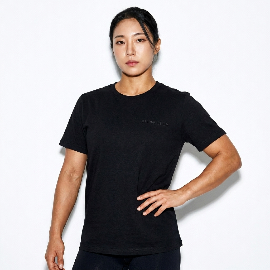 Women's Relaxed T-Shirt worn by a athletic muscular Korean female fashion influencer, sporty athleisure styling, studio lookbook — custom women's relaxed t-shirt