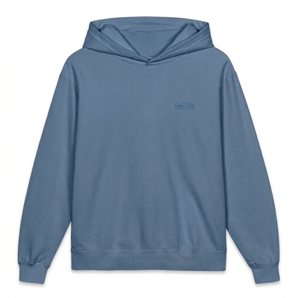 Custom Youth Garment-Dyed Hooded Sweatshirt design direction 1: Tonal Minimalist Wordmark featuring the EMBER wordmark